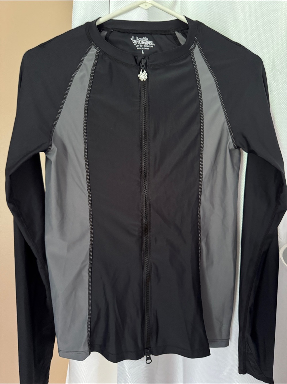 UV Skins zip up
